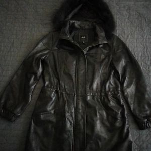 Beautiful women's black, 100% leather coat  with fur lined hood size small from